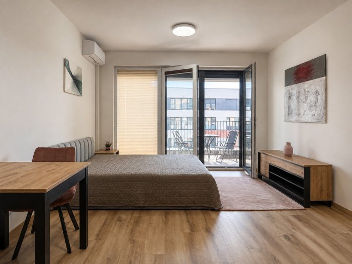Zcela nový, plně vybavený byt 32,2 m² v projektu Tesla Hloubětín – balkon a parkovací místo
